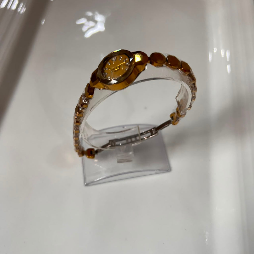 Geometric Diamond-Cut Gold Bracelet Watch