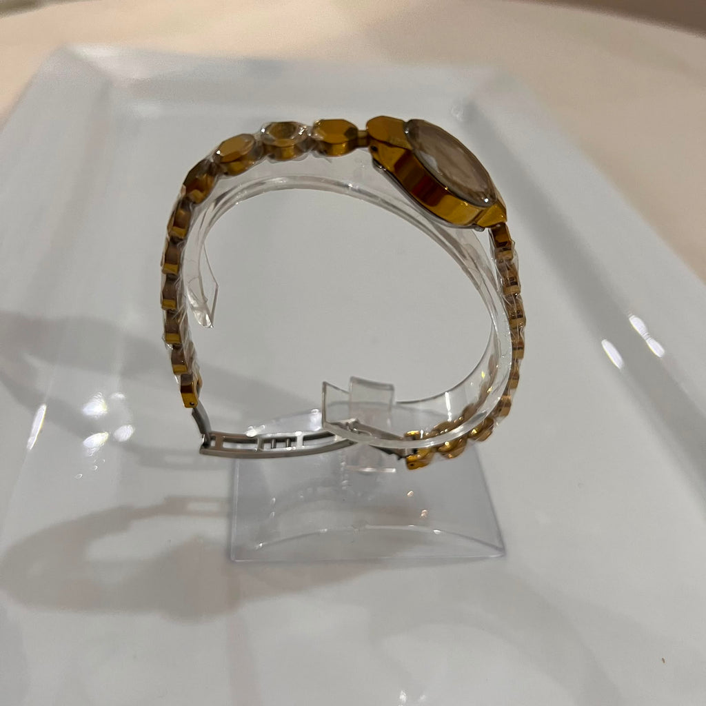 Geometric Diamond-Cut Gold Bracelet Watch