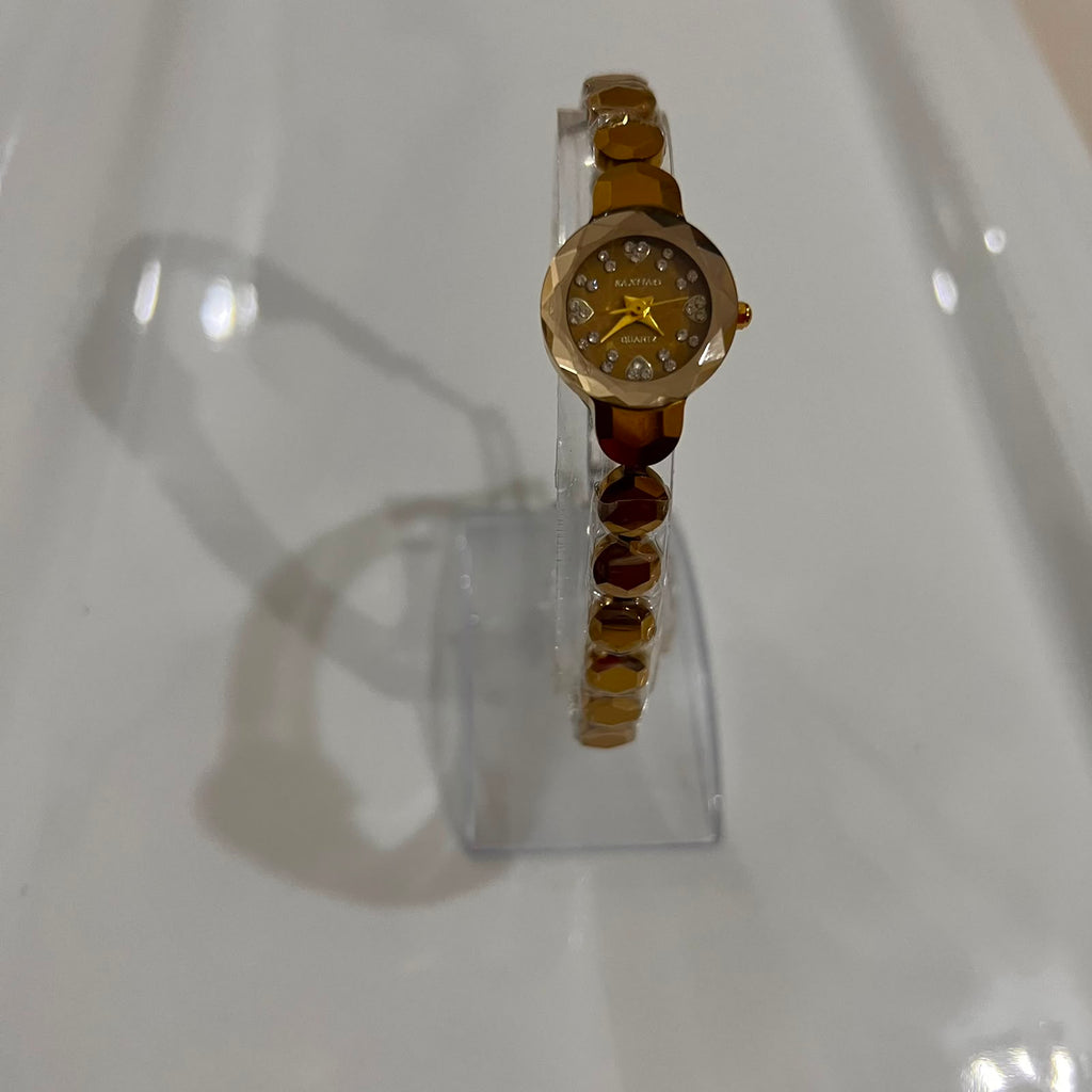 Geometric Diamond-Cut Gold Bracelet Watch