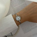 Classic Silver Round Dial Watch